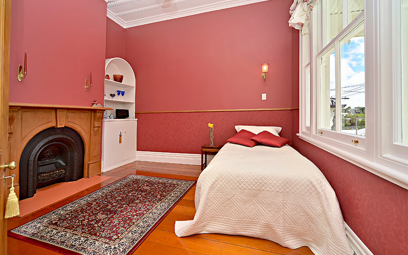 Villa bedroom with open fireplace