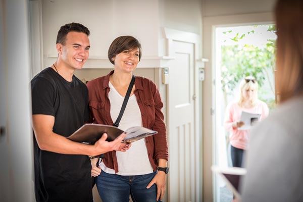 Couple at open home